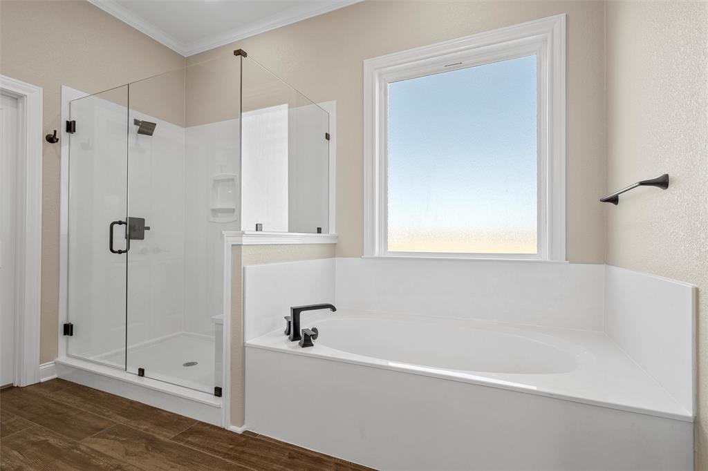 109 Water View Lane Robinson, TX 76706 - Photo 16 of 35 a white bath tub sitting next to a shower