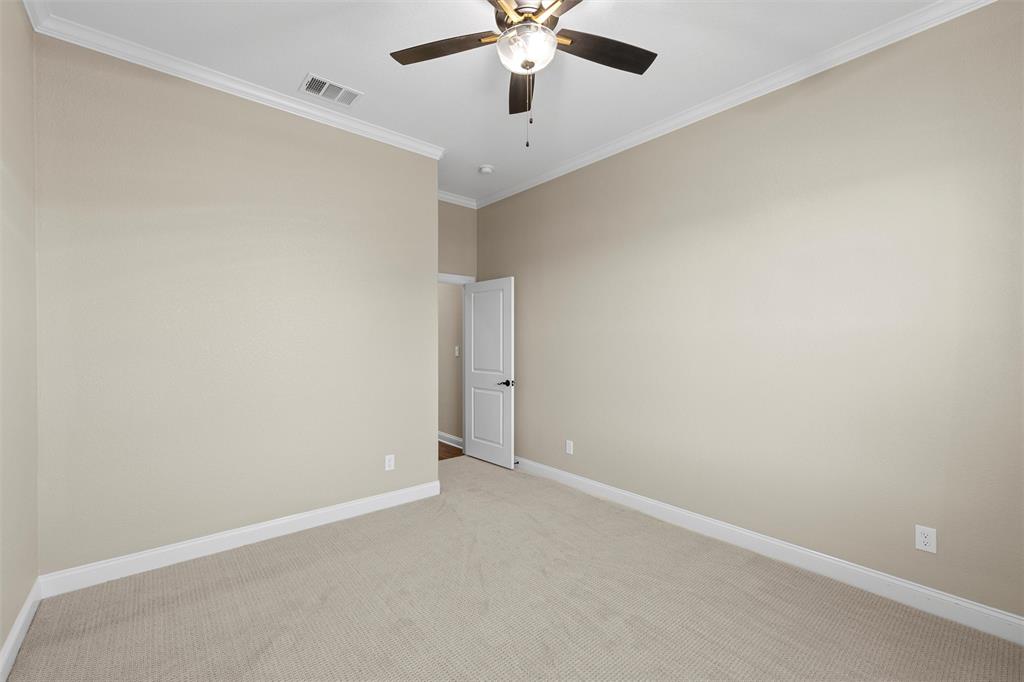 109 Water View Lane Robinson, TX 76706 - Photo 19 of 35 an empty room with a ceiling fan and a window