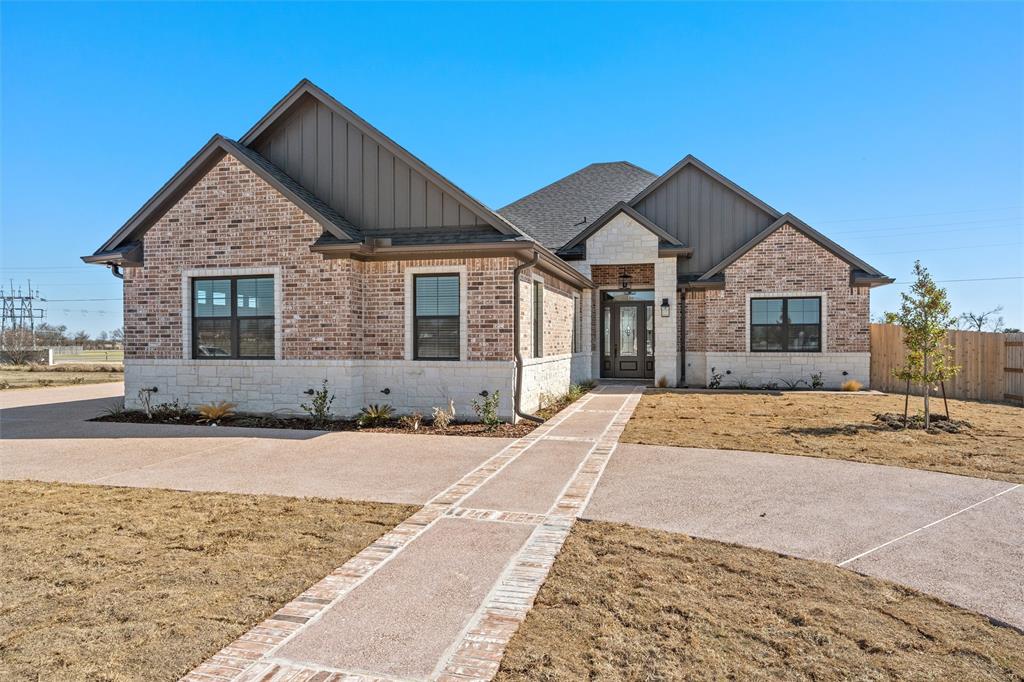 109 Water View Lane Robinson, TX 76706 - Photo 2 of 35 a front view of a house with a yard