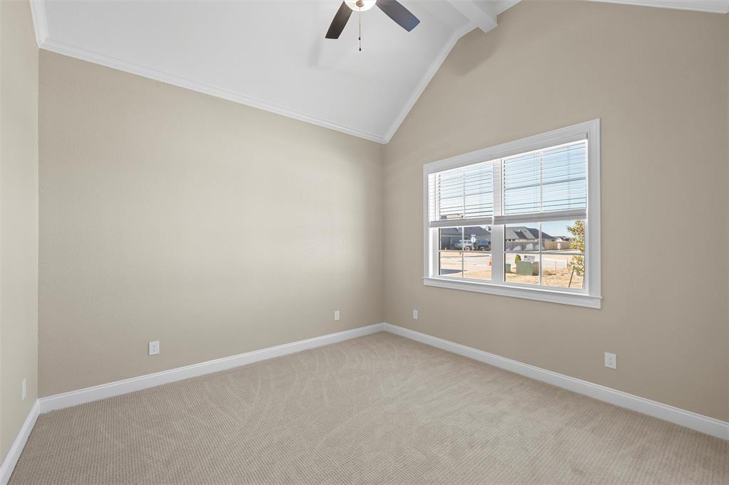 109 Water View Lane Robinson, TX 76706 - Photo 22 of 35 an empty room with a window and a ceiling fan