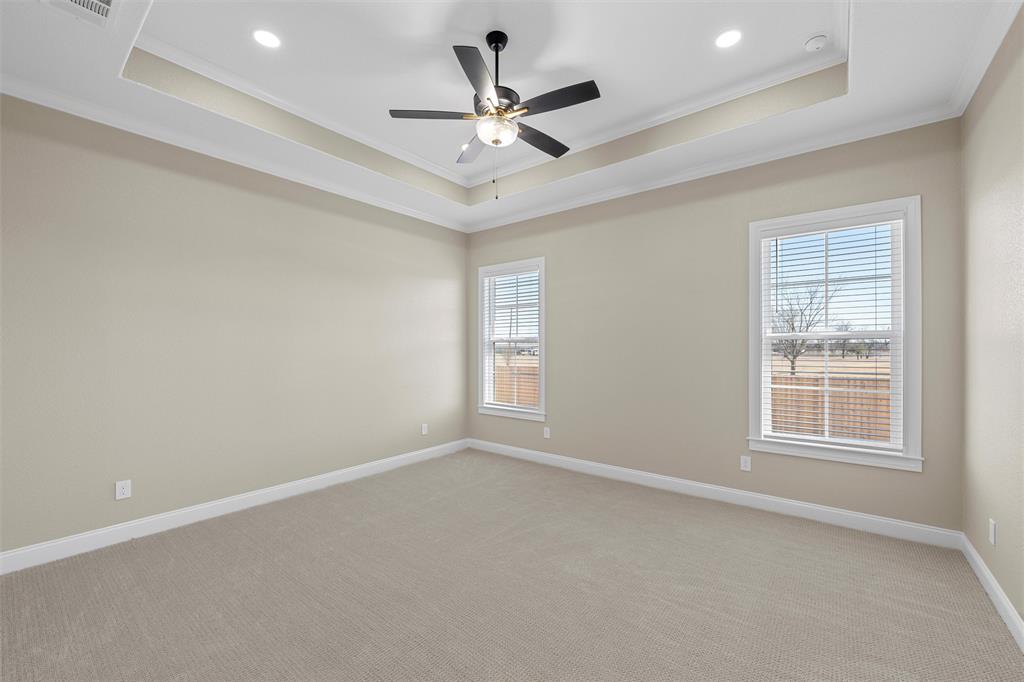 109 Water View Lane Robinson, TX 76706 - Photo 26 of 35 an empty room with ceiling fan and windows