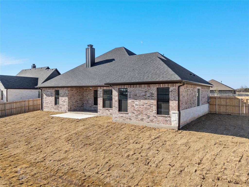 109 Water View Lane Robinson, TX 76706 - Photo 32 of 35 a front view of a house with a yard