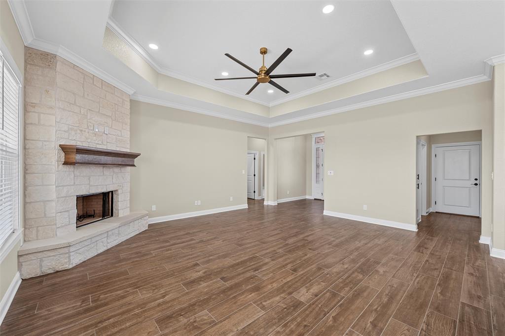 109 Water View Lane Robinson, TX 76706 - Photo 6 of 35 a view of empty room with wooden floor and ceiling fan