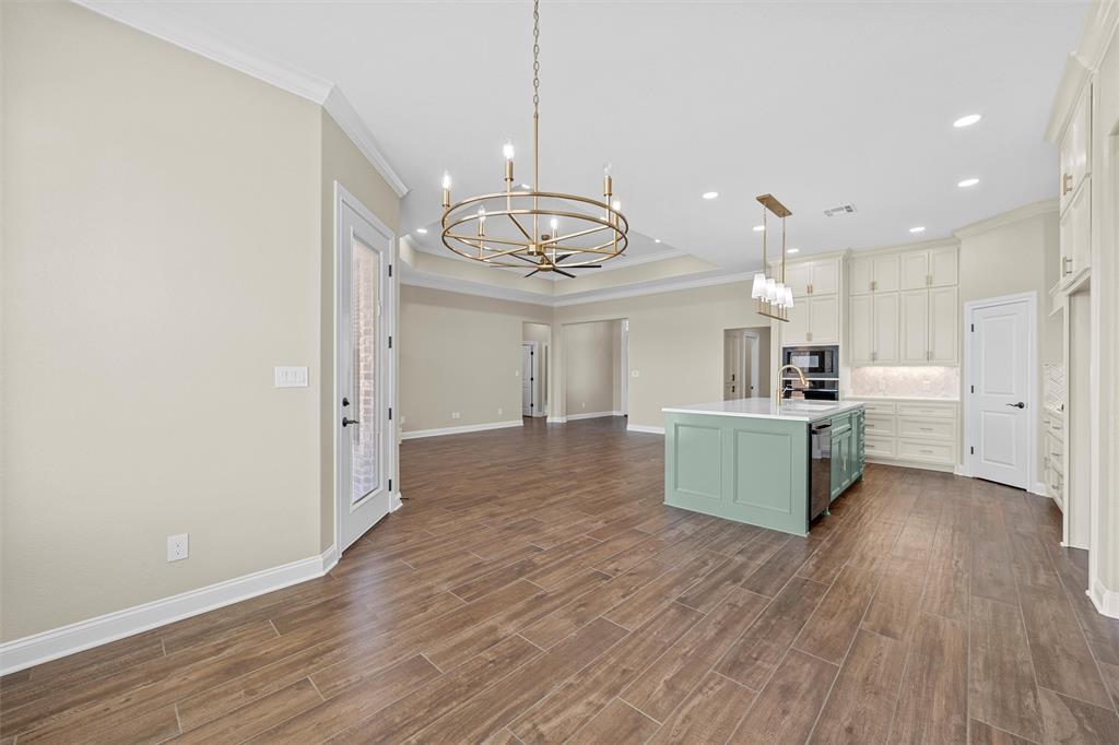 109 Water View Lane Robinson, TX 76706 - Photo 7 of 35 a large kitchen with a lot of counter space and wooden floor