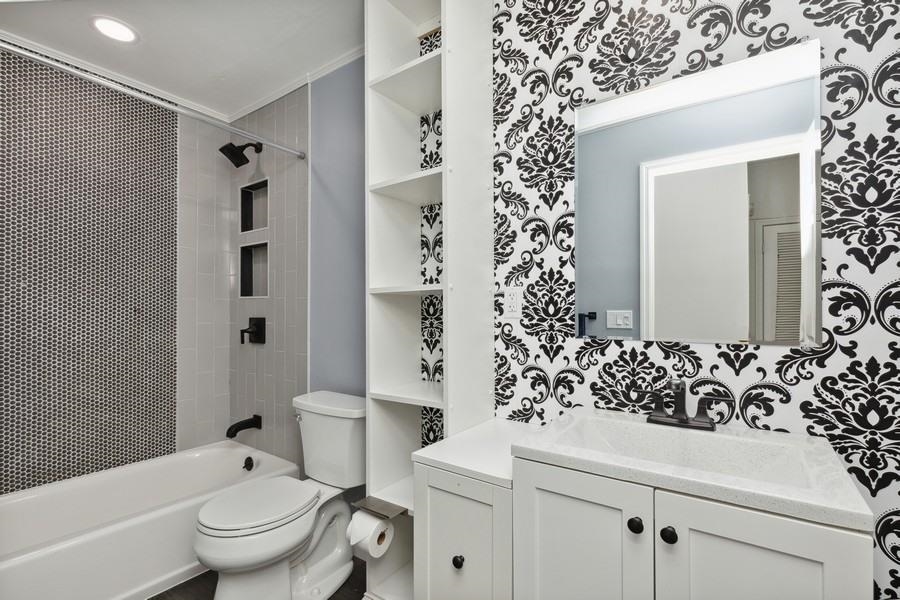 64 James Street, Unit 2 Newark, NJ 07102 - Photo 7 of 9 a bathroom with a sink toilet and shower