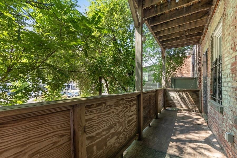 64 James Street, Unit 2 Newark, NJ 07102 - Photo 8 of 9 a view of a wooden deck with a yard