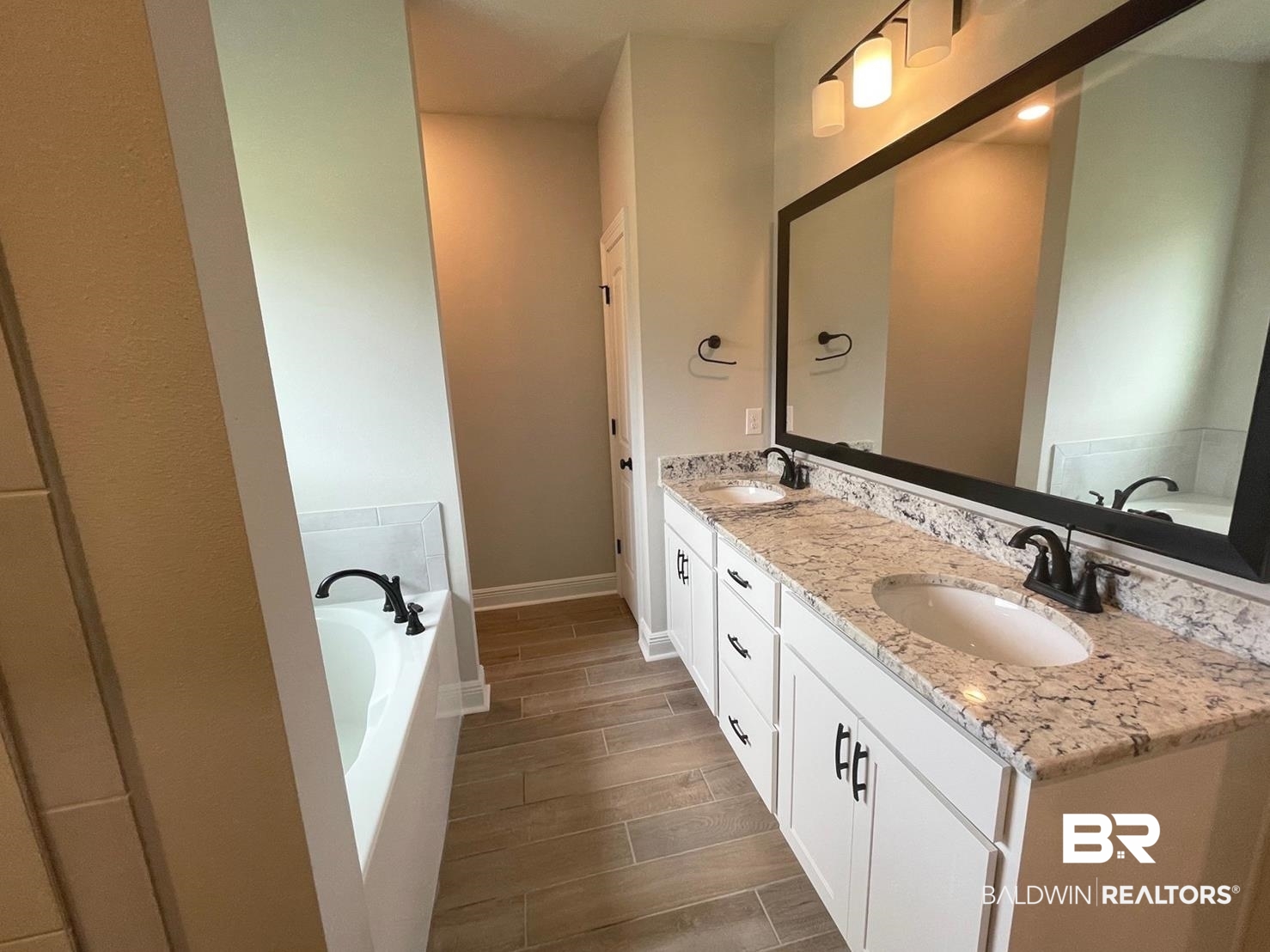 1412 Fenton Circle Foley, AL 36535 - Photo 8 of 15 Bathroom featuring a bath and vanity