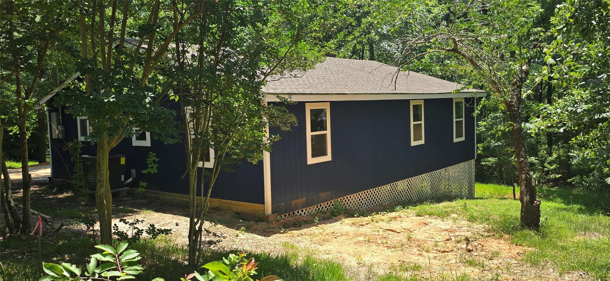 110 Hidden Circle Coldspring, TX 77331 - Photo 17 of 24 Side view of home