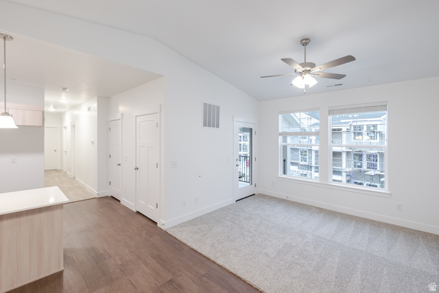 4661 Poplar Way, Unit R302 Mapleton, UT 84664 - Photo 16 of 17 Unfurnished room with lofted ceiling, dark wood-style floors, and ceiling fan