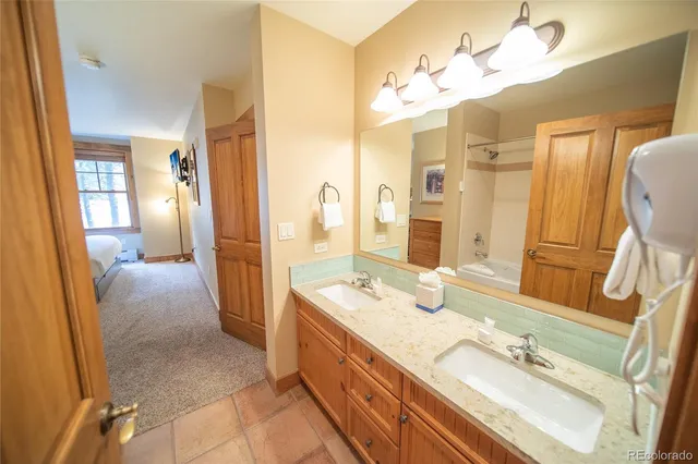 a bed room with a bed and furniture