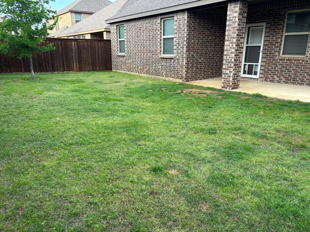 4617 Azurite Road Little Elm, TX 76227 - Photo 11 of 12 a view of a backyard