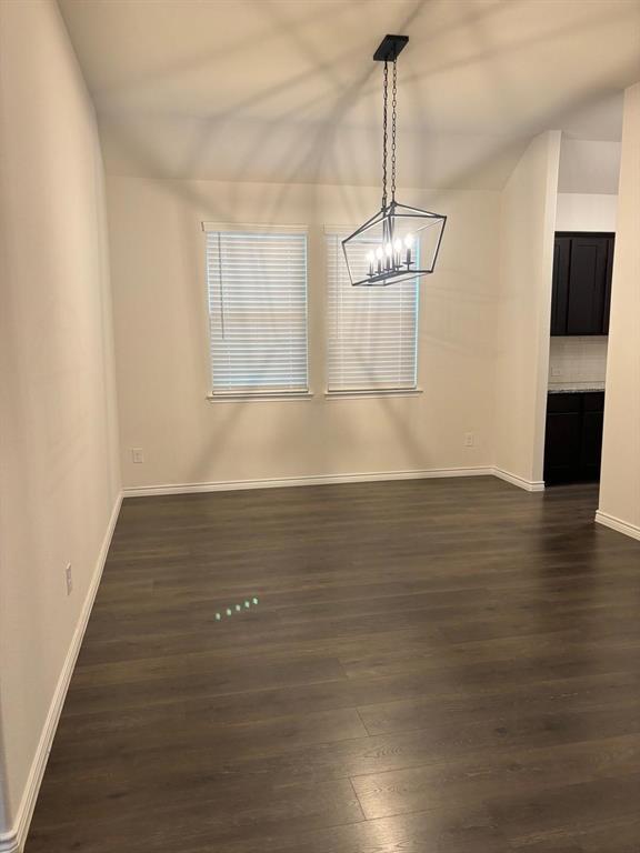 4617 Azurite Road Little Elm, TX 76227 - Photo 2 of 12 a view of wooden floor and windows in a room
