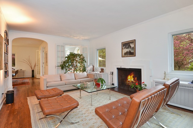 63 Abbotsford Road Winnetka, IL 60093 - Photo 3 of 25 a living room with furniture and a fireplace