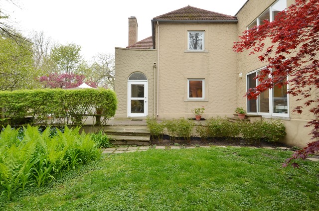 63 Abbotsford Road Winnetka, IL 60093 - Photo 24 of 25 a front view of a house with a yard