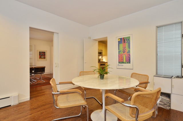 63 Abbotsford Road Winnetka, IL 60093 - Photo 10 of 25 a view of a dining room with furniture and wooden floor