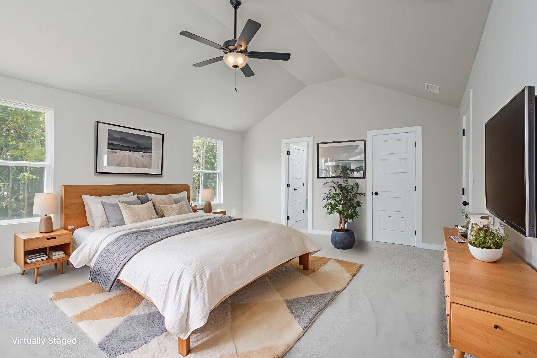 0 Poplar Way Dickson, TN 37055 - Photo 24 of 49 a spacious bedroom with a bed and a flat screen television