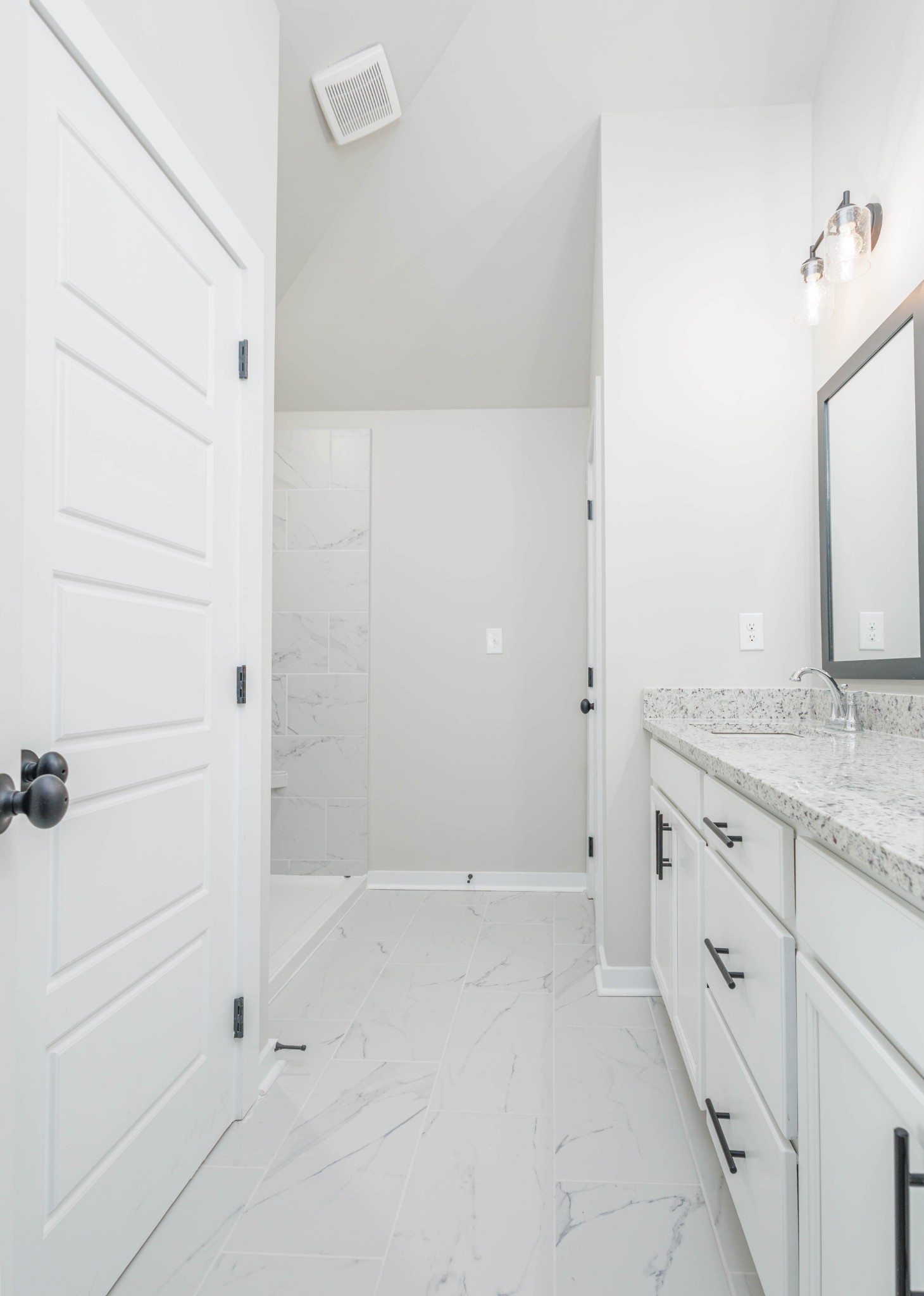 0 Poplar Way Dickson, TN 37055 - Photo 30 of 49 a bathroom with a granite countertop sink and white cabinets