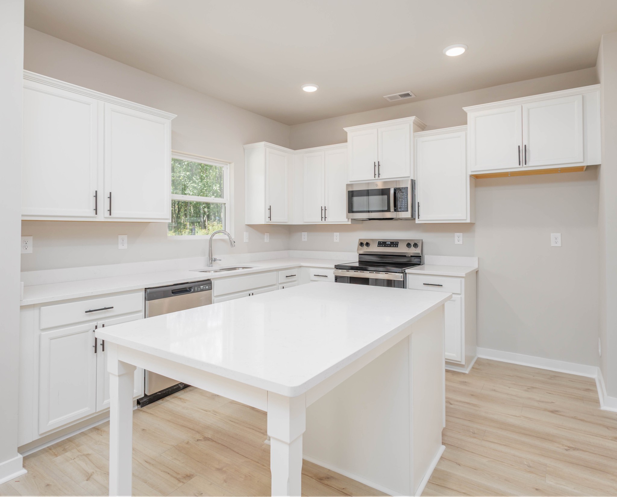 0 Poplar Way Dickson, TN 37055 - Photo 5 of 49 a kitchen with a stove a sink and a refrigerator