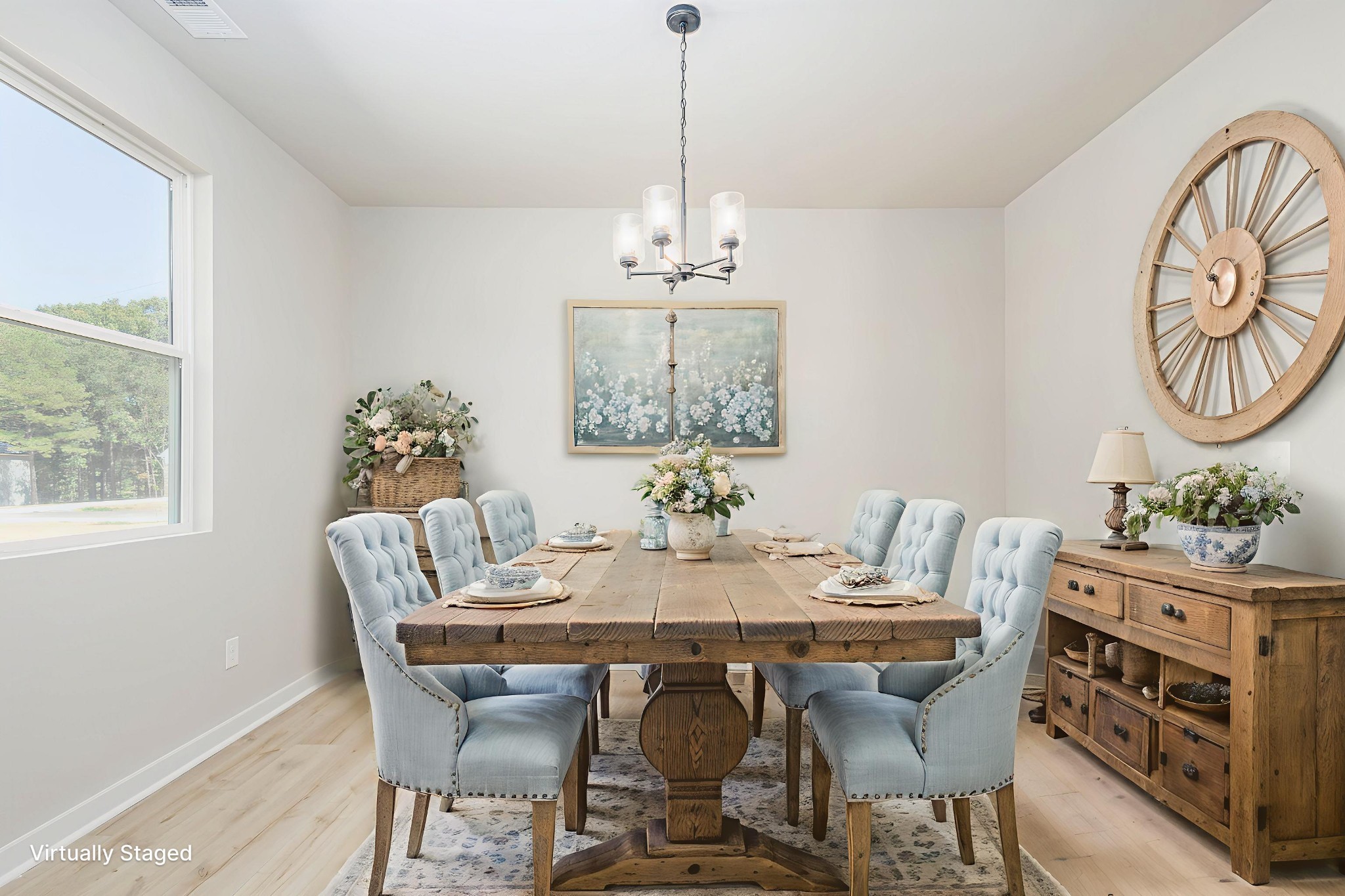 0 Poplar Way Dickson, TN 37055 - Photo 9 of 49 a dining room with furniture a potted plant and a chandelier
