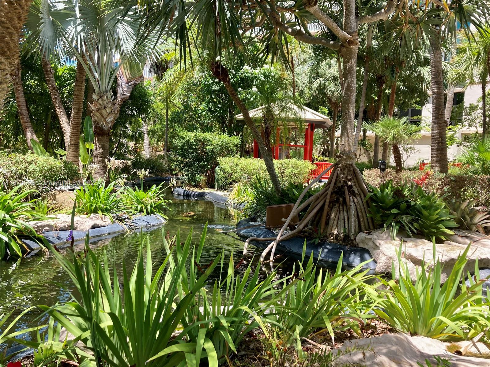 1111 Crandon Boulevard, Unit B606 Key Biscayne, FL 33149 - Photo 23 of 33 a view of outdoor space and garden