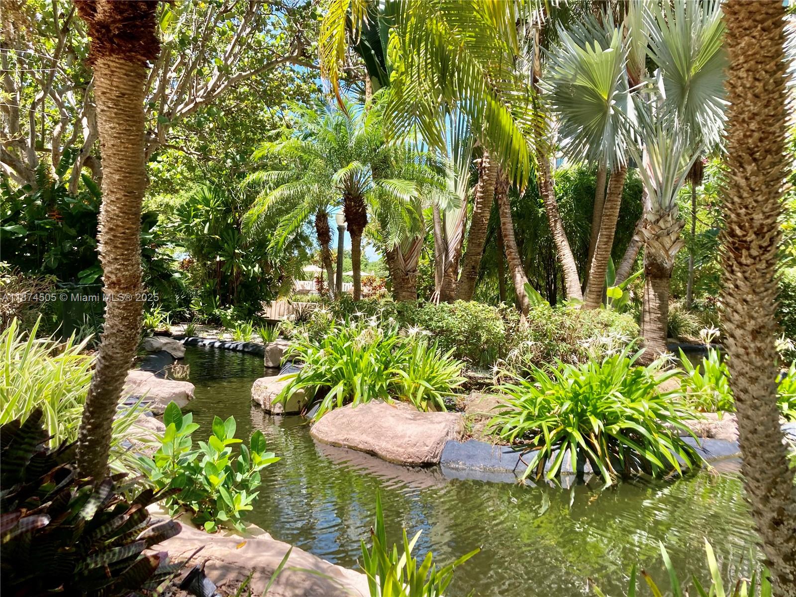 1111 Crandon Boulevard, Unit B606 Key Biscayne, FL 33149 - Photo 24 of 33 a view of a garden