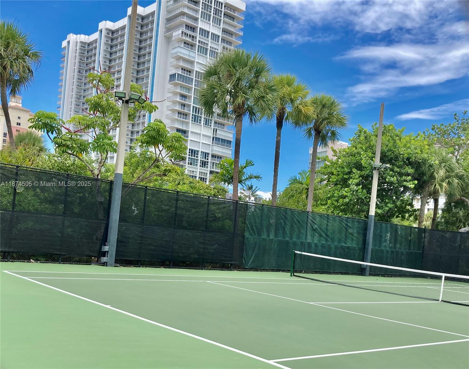 1111 Crandon Boulevard, Unit B606 Key Biscayne, FL 33149 - Photo 32 of 33 a view of a tennis court