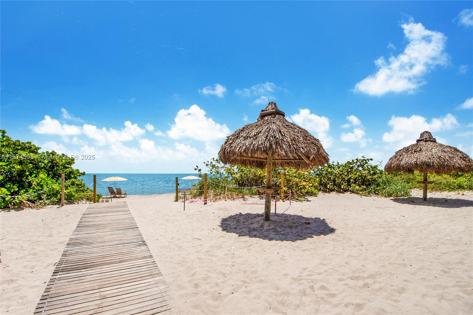 1111 Crandon Boulevard, Unit B606 Key Biscayne, FL 33149 - Photo 9 of 33 a view of a backyard