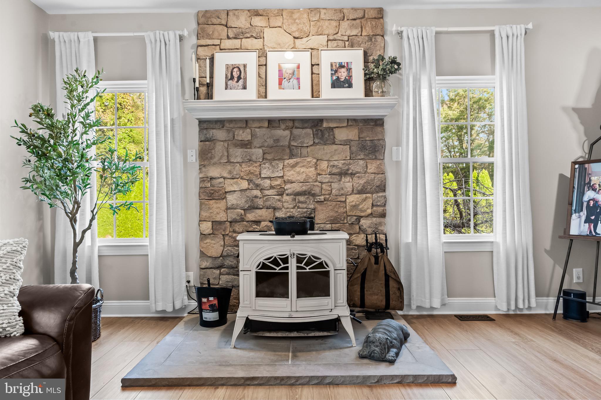 3653 Tuckahoe Road Franklinville, NJ 08322 - Photo 14 of 41 a living room with furniture and a fireplace