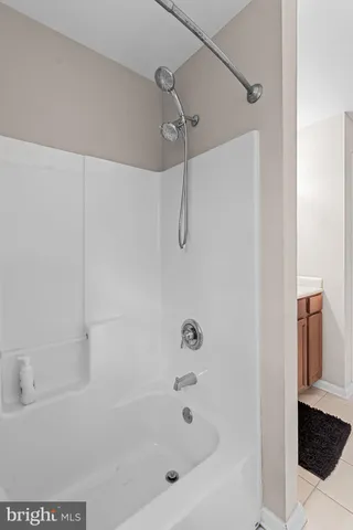 a close view of a bathtub in bathroom