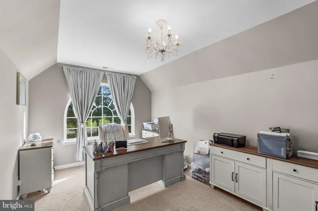 a kitchen with stainless steel appliances a sink and cabinets