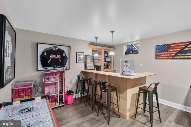 a view of a livingroom with furniture and wooden floor