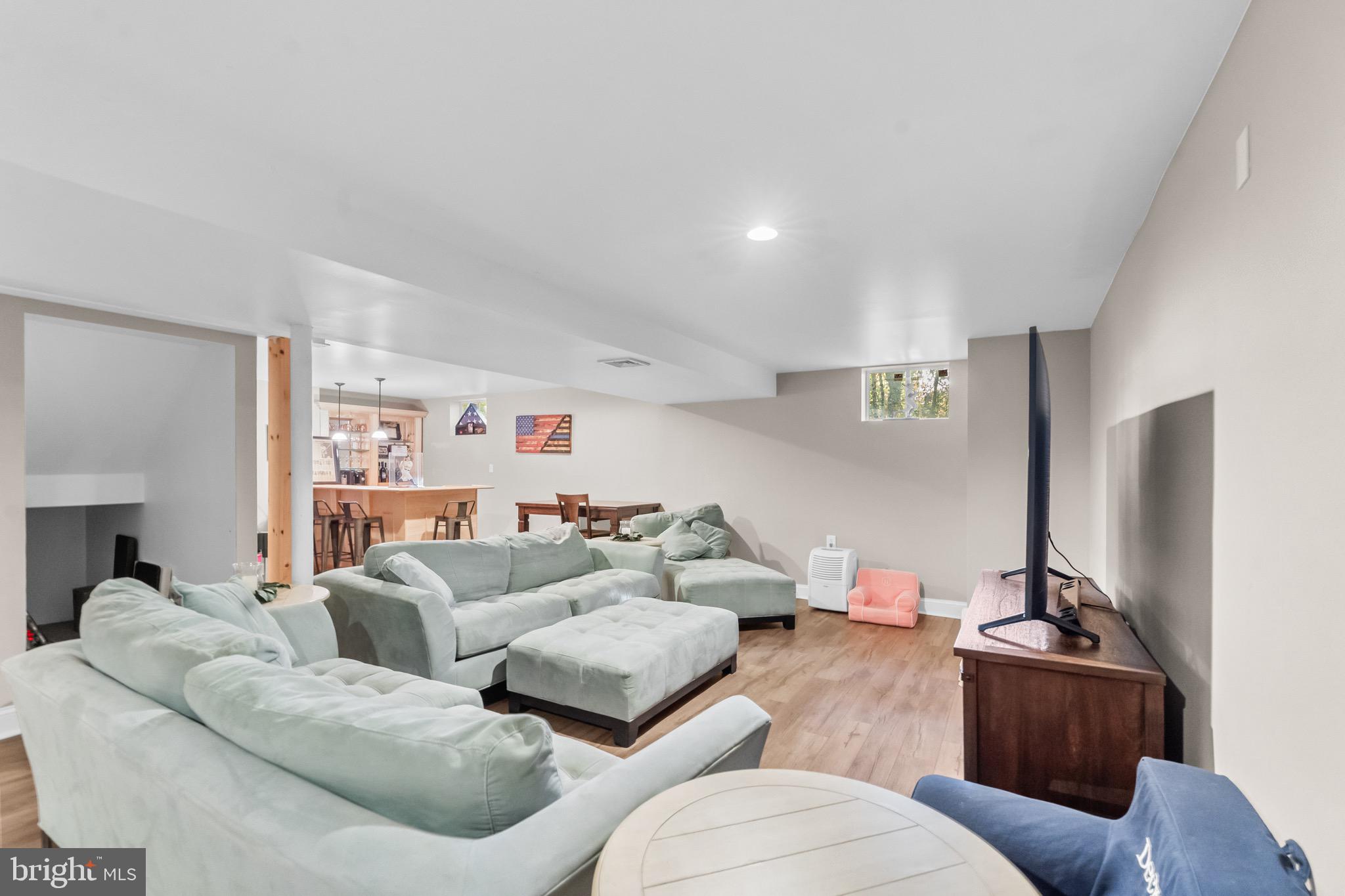 3653 Tuckahoe Road Franklinville, NJ 08322 - Photo 37 of 41 a living room with furniture and a flat screen tv