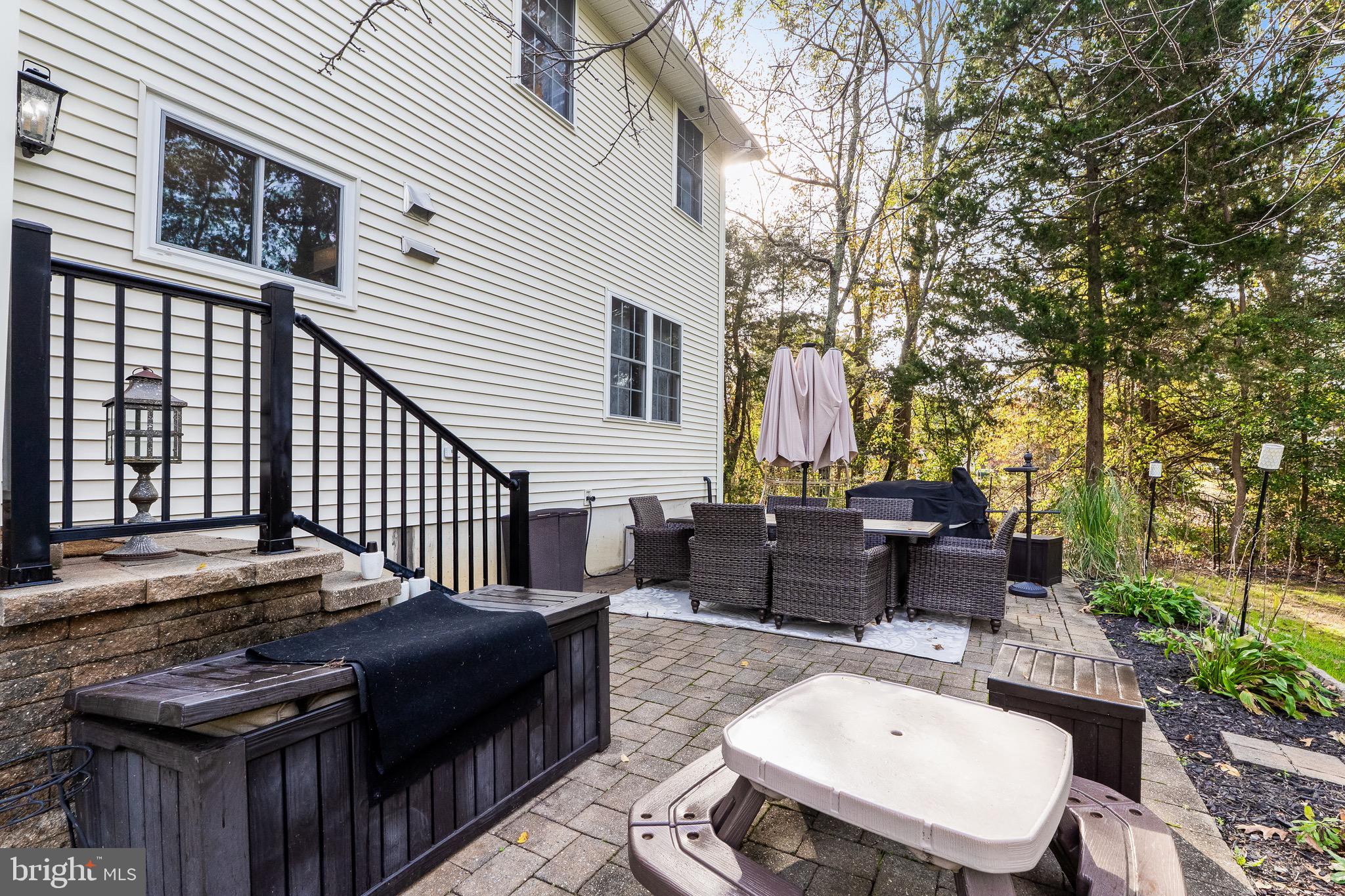 3653 Tuckahoe Road Franklinville, NJ 08322 - Photo 39 of 41 a view of a patio with table and chairs with wooden floor and fence