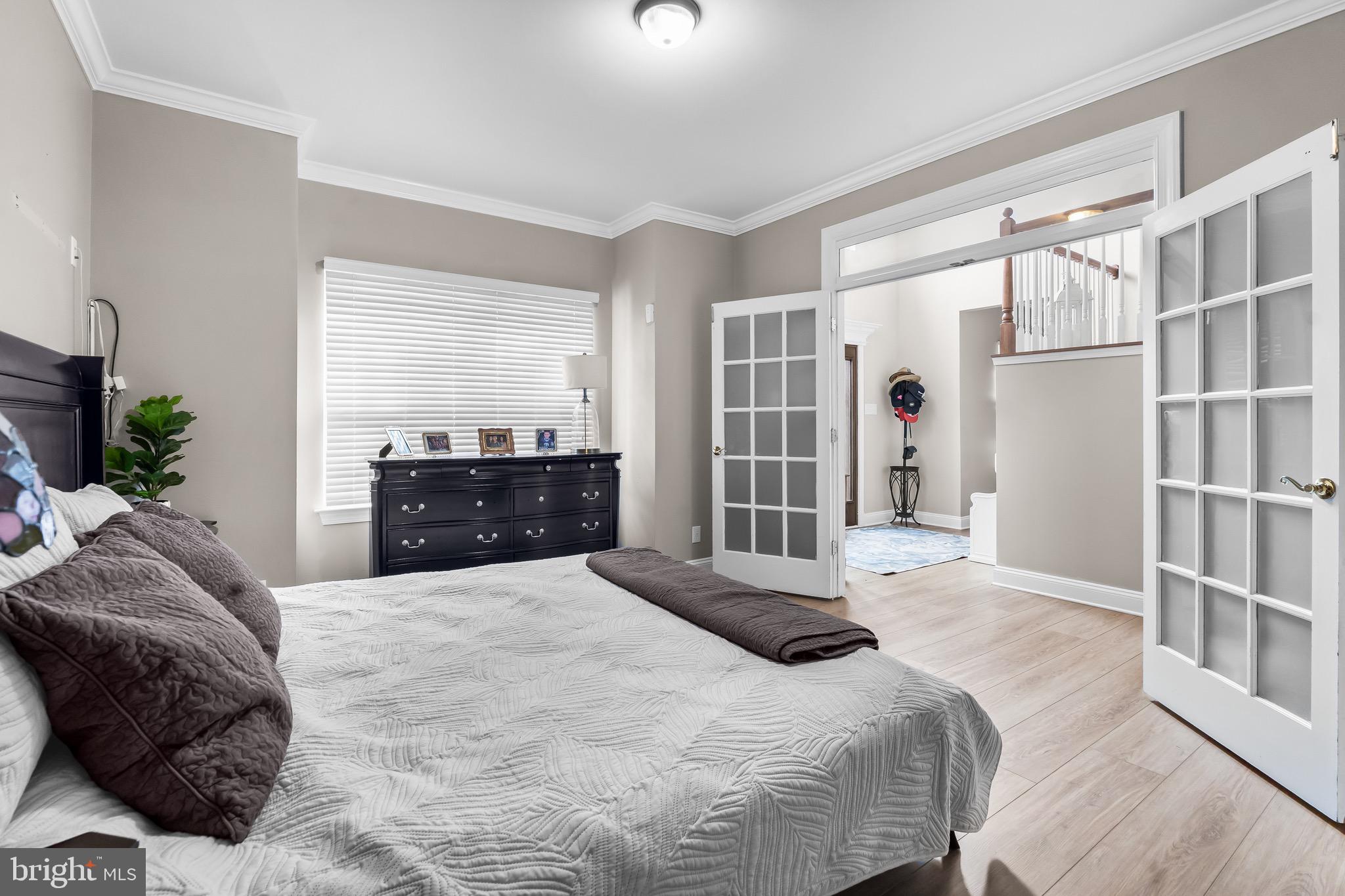 3653 Tuckahoe Road Franklinville, NJ 08322 - Photo 5 of 41 a large bedroom with a bed and a large window