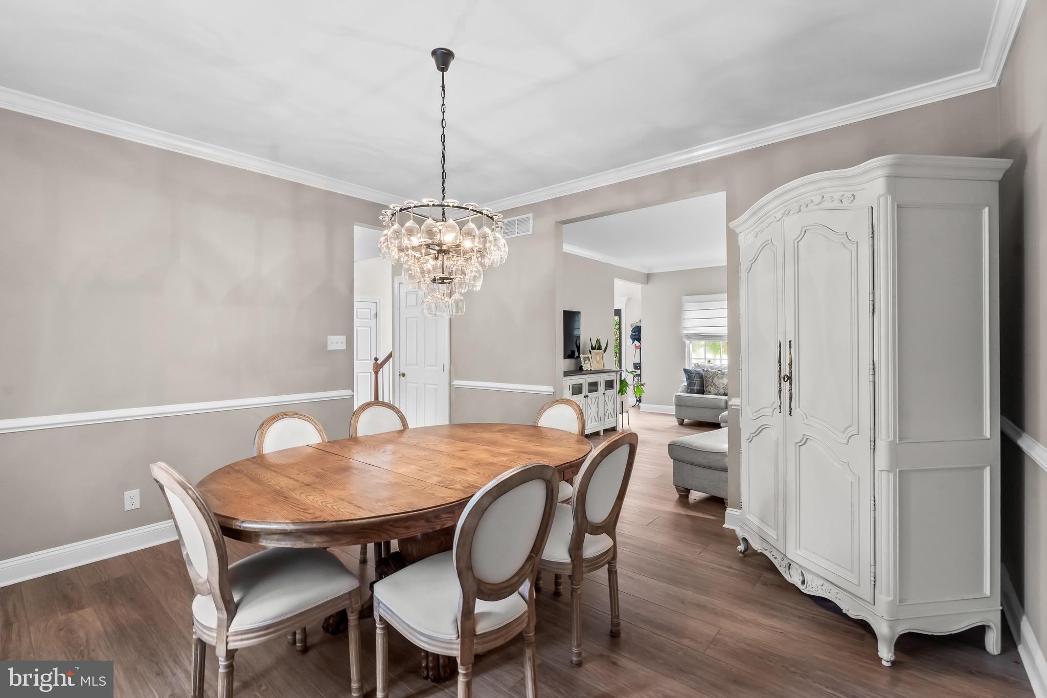 3653 Tuckahoe Road Franklinville, NJ 08322 - Photo 9 of 41 a view of a dining room with furniture wooden floor and chandelier