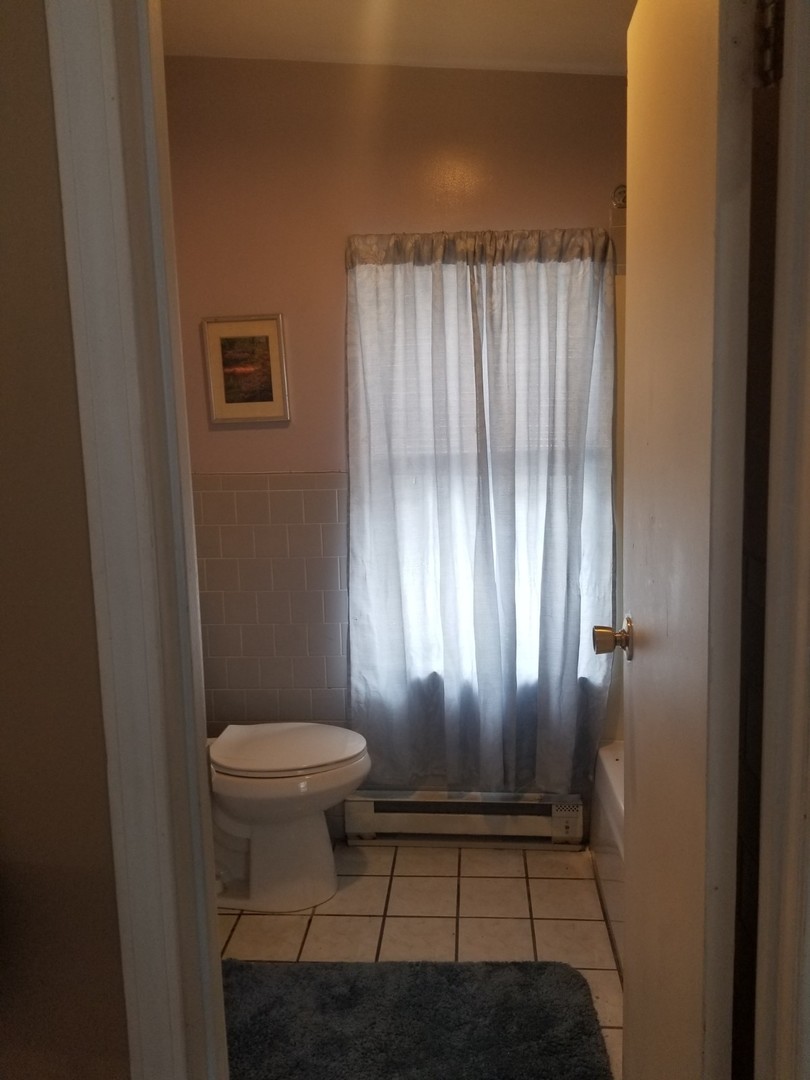 4019 North Tripp Avenue Chicago, IL 60641 - Photo 8 of 31 a view of small space with a door