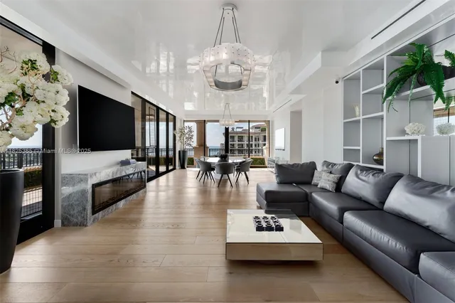 a view of hallway with living room and dining room