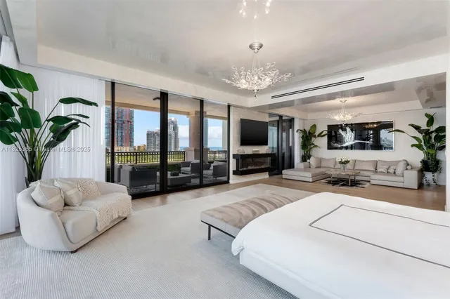 a white bath tub sitting in a bathroom and shower