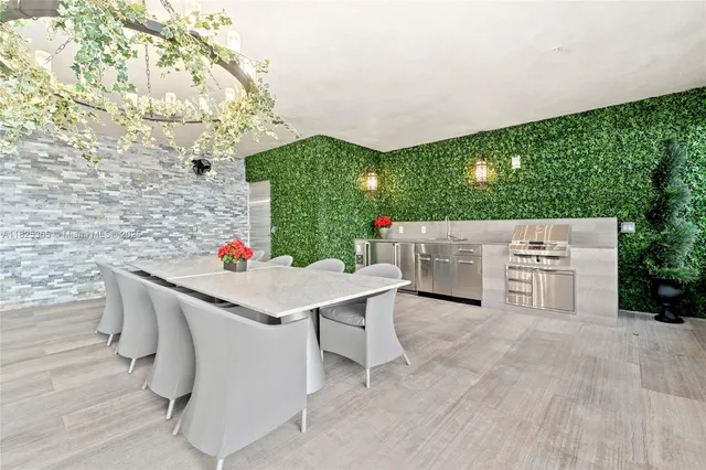 a bed sitting in a bedroom next to a window and a shower