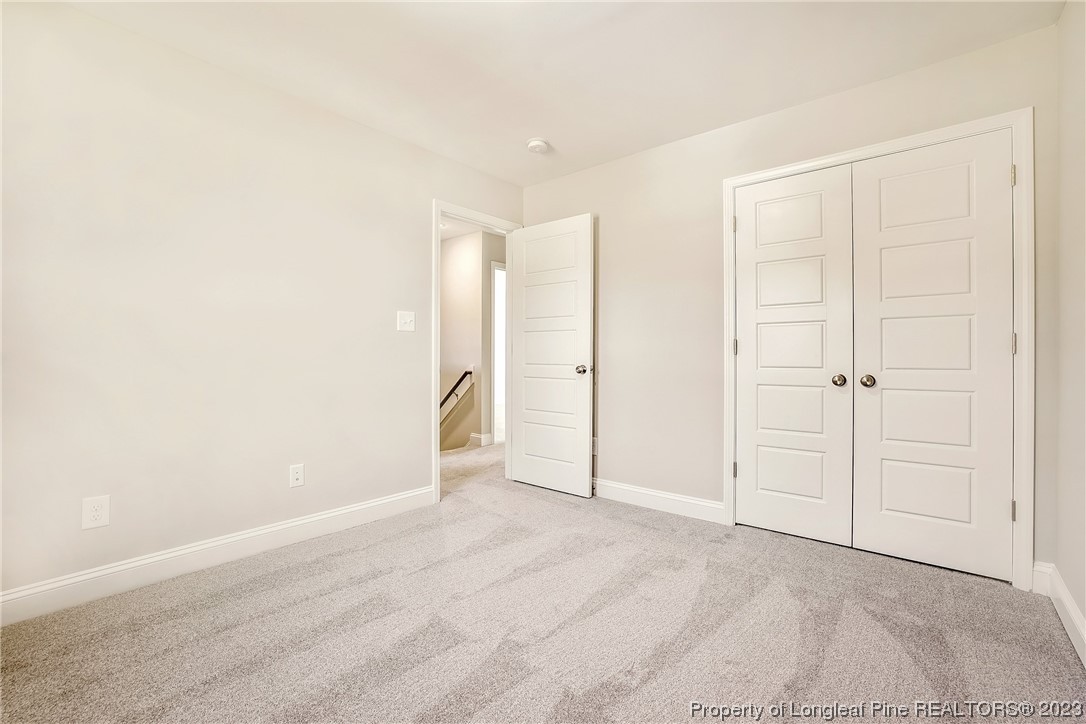 5326 Pittman Grove Church Road Raeford, NC 28376 - Photo 23 of 34 an empty room with a natural light