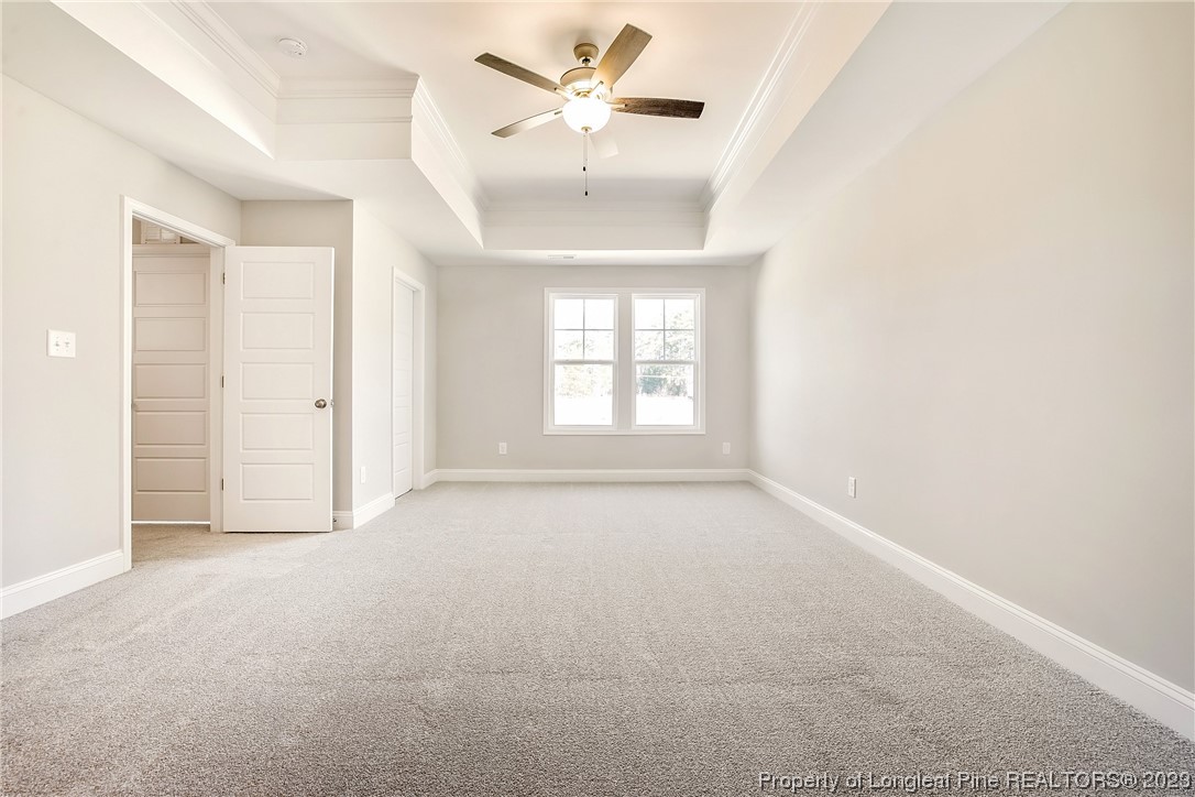 5326 Pittman Grove Church Road Raeford, NC 28376 - Photo 26 of 34 an empty room with windows and fan