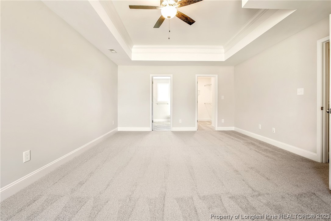 5326 Pittman Grove Church Road Raeford, NC 28376 - Photo 27 of 34 an empty room with a ceiling fan and window