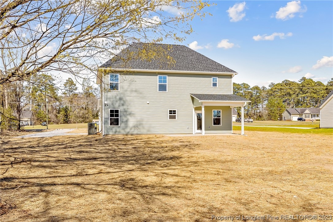 5326 Pittman Grove Church Road Raeford, NC 28376 - Photo 32 of 34 a front view of a house with a ocean view