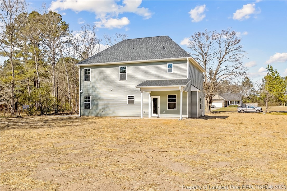 5326 Pittman Grove Church Road Raeford, NC 28376 - Photo 34 of 34 a front view of a house with a yard