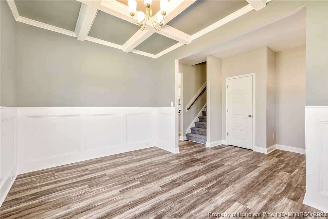 5326 Pittman Grove Church Road Raeford, NC 28376 - Photo 7 of 34 a view of a big room with wooden floor and staircase