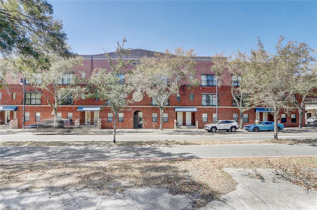 20 Southwest 6th Street, Unit 309 Gainesville, FL 32601 - Photo 1 of 1 front view of a building with a street