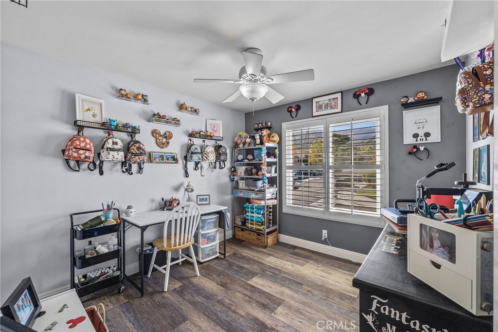 8992 Dahlia Drive Corona, CA 92883 - Photo 19 of 38 a living room with furniture and a flat screen tv