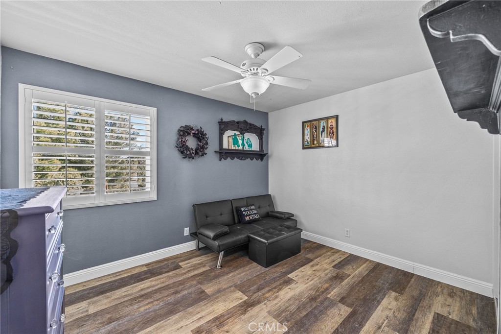8992 Dahlia Drive Corona, CA 92883 - Photo 21 of 38 a living room with furniture and a window