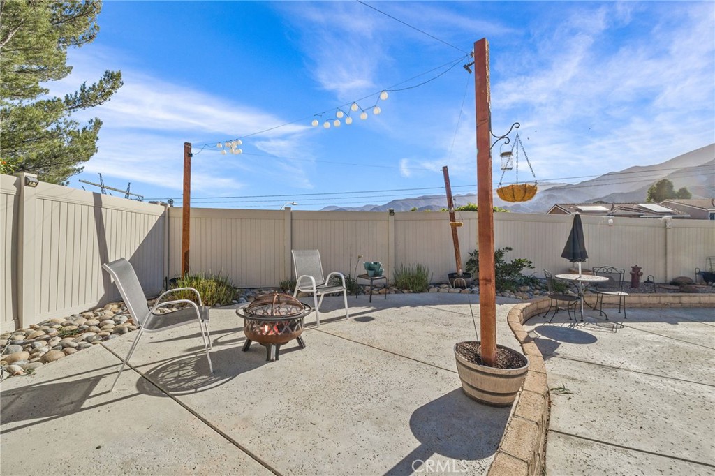 8992 Dahlia Drive Corona, CA 92883 - Photo 34 of 38 a view of the patio with chairs