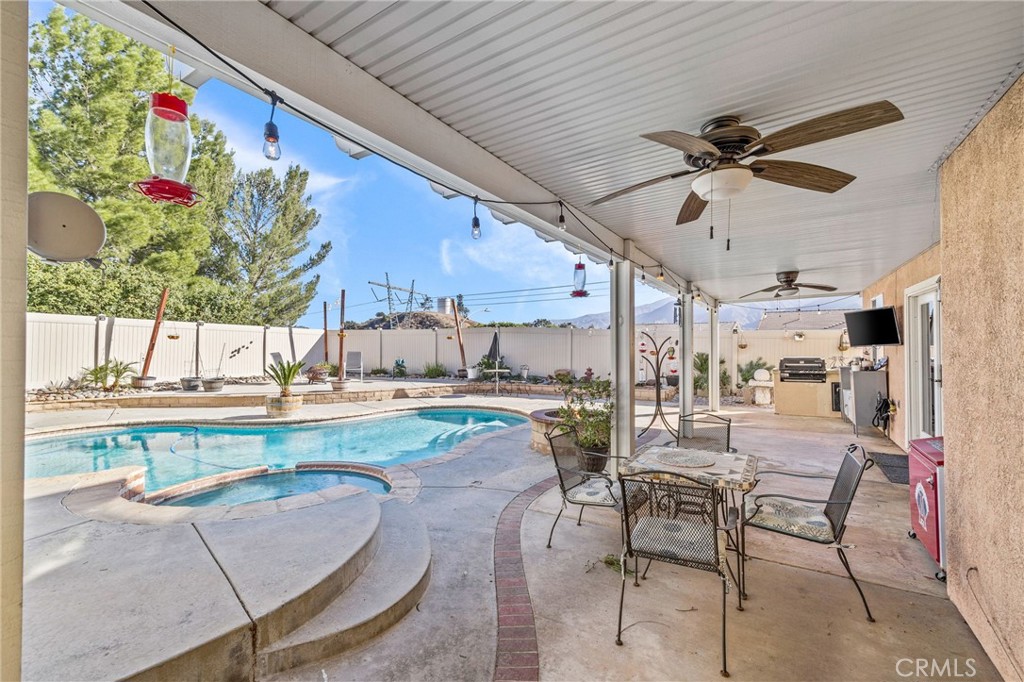 8992 Dahlia Drive Corona, CA 92883 - Photo 36 of 38 a view of a swimming pool and lounge chair